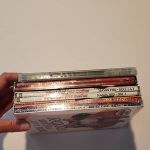 New in packages!   DVD Seasons 1 thru 4 of How I Met Your Mother